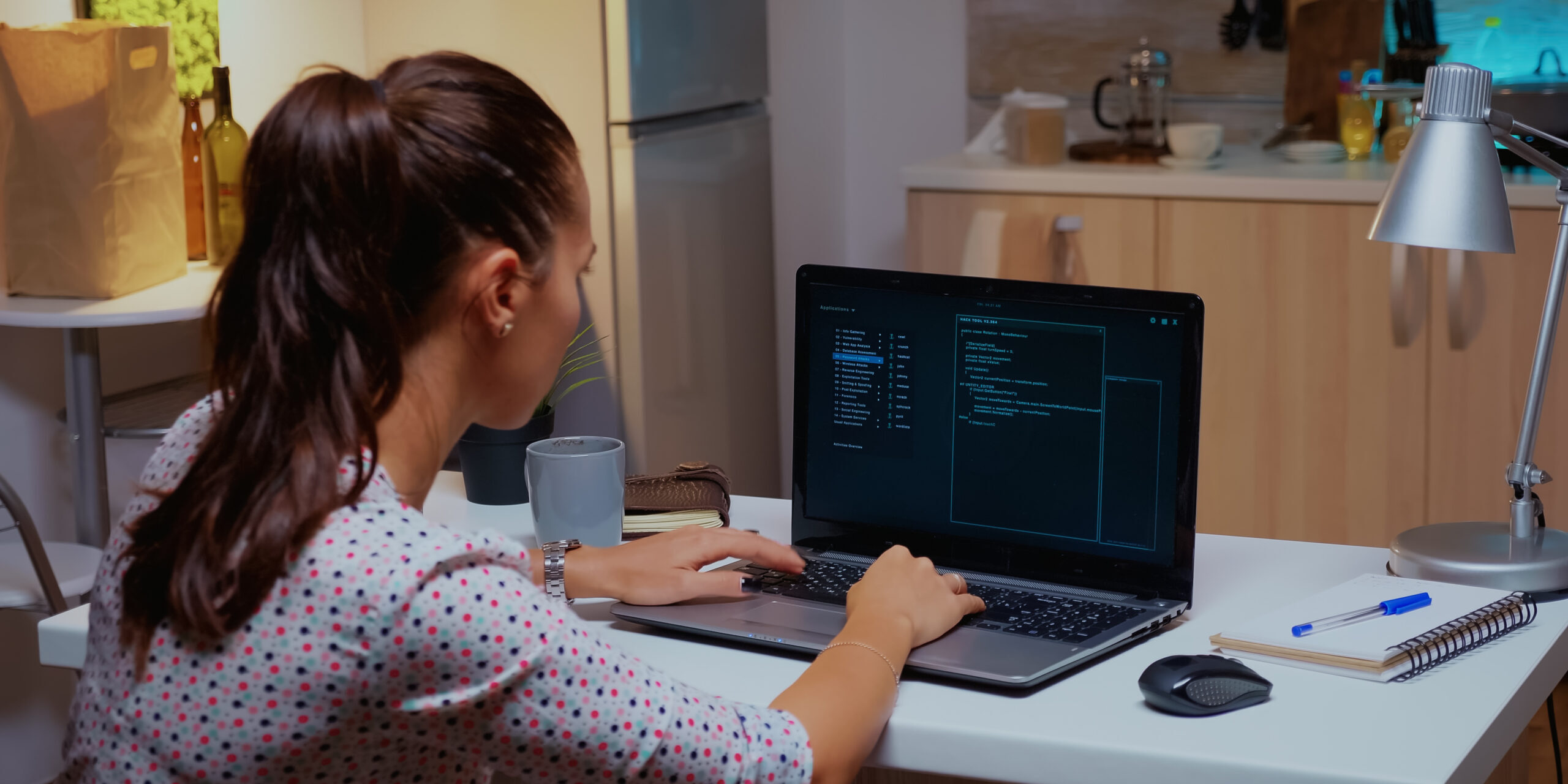 Back view of woman hacker coding a dangerous virus cyber security, how to keep up with cyber security, why you should invest in cyber security