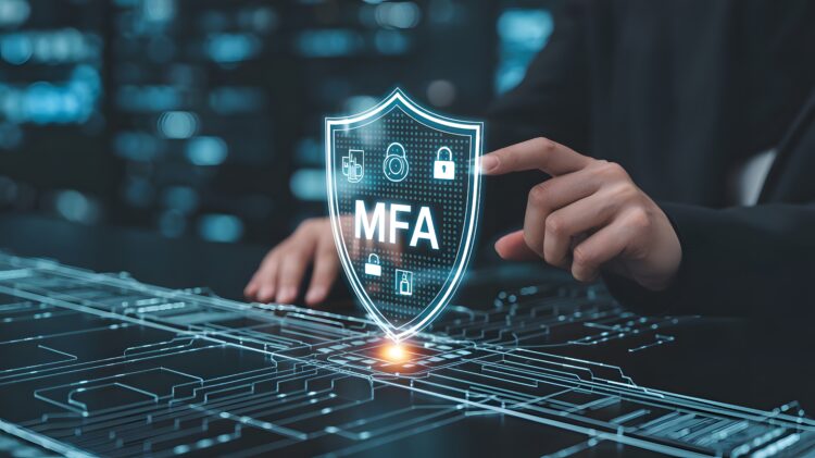 User interacting with digital shield displaying MFA (multi-factor authentication) icons, symbolizing cybersecurity protection.