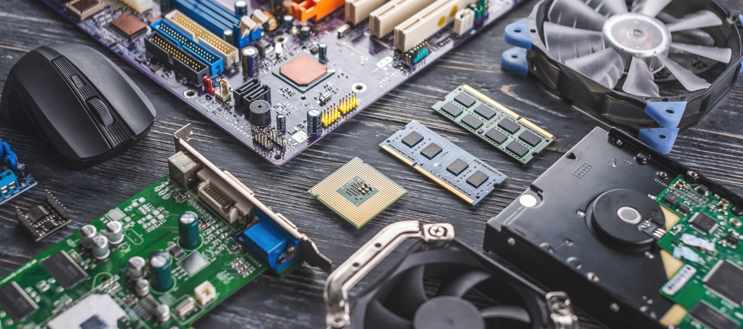 Assorted internal computer components showing aging hardware parts that may impact performance and security in business computers