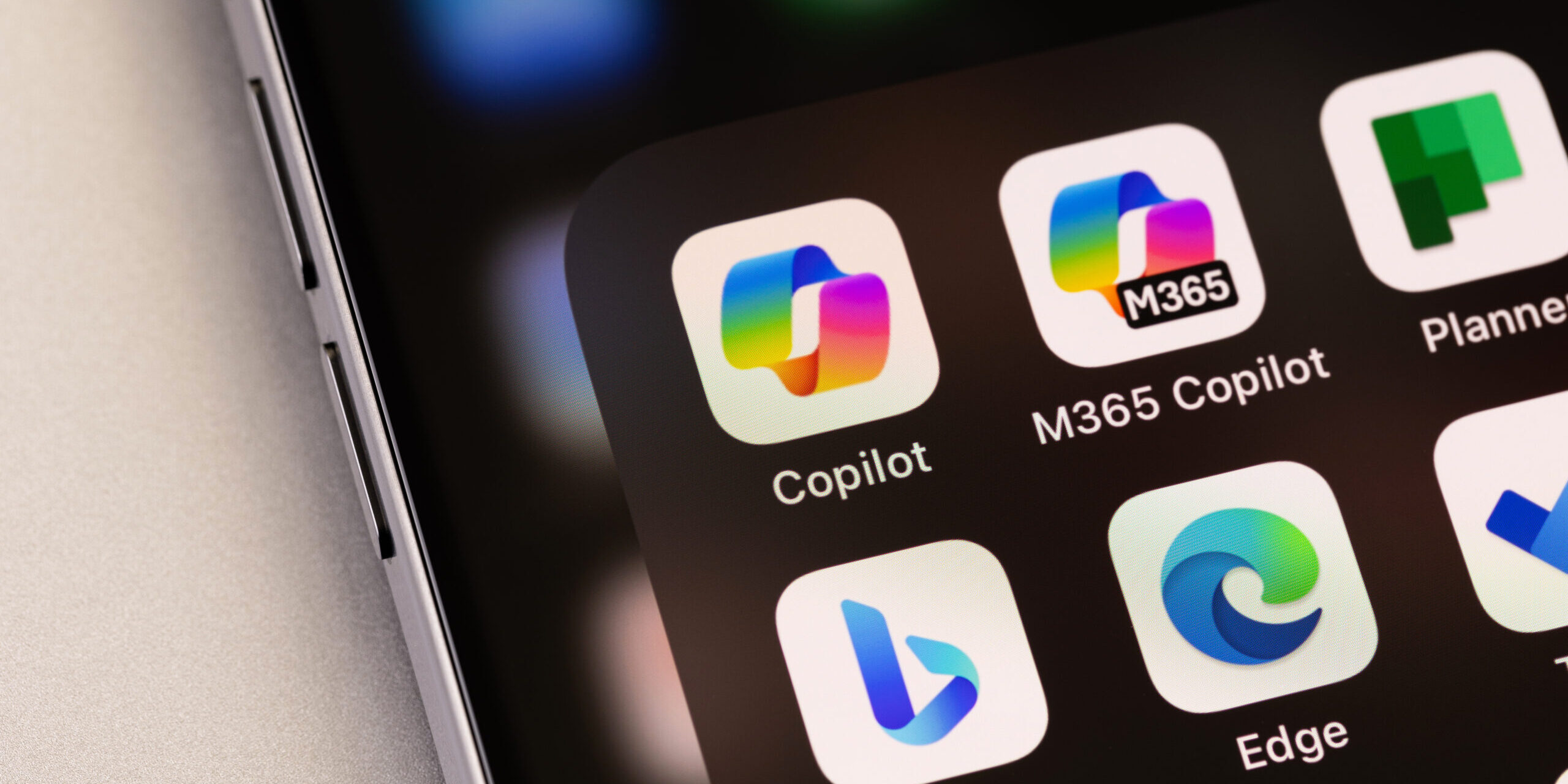 Microsoft 365 Applications and Copilot Interface on Mobile Device Microsoft 365 apps including Copilot, Bing, and Edge displayed on a mobile device, representing cloud services and productivity tools used in Microsoft environments