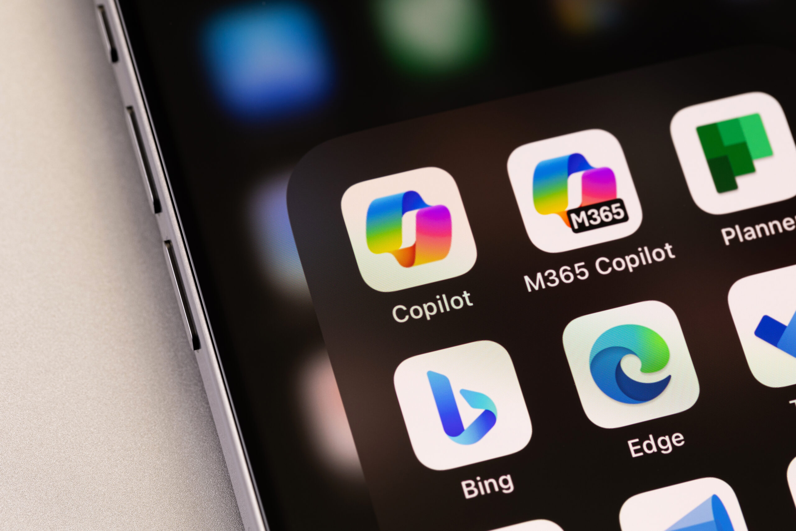 Microsoft 365 apps including Copilot, Bing, and Edge displayed on a mobile device, representing cloud services and productivity tools used in Microsoft environments