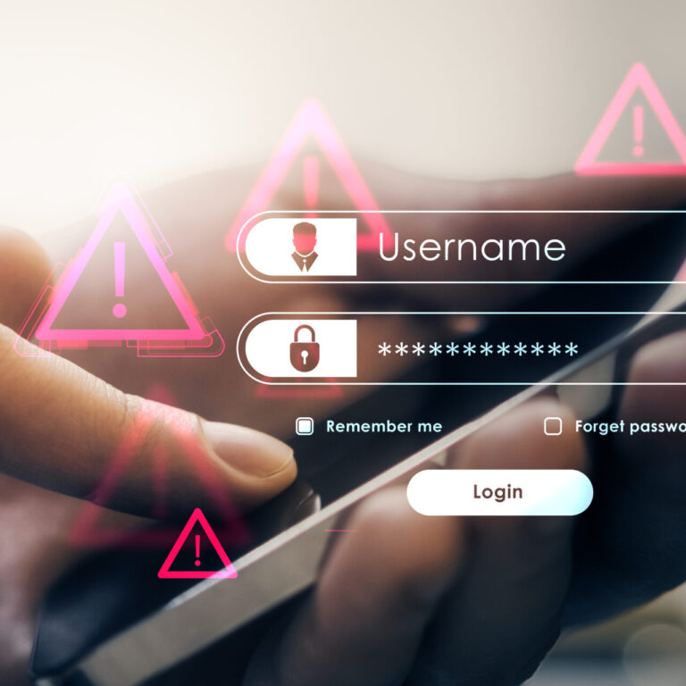 User login screen on mobile device with security warning icons highlighting risks of unused accounts and unauthorized access