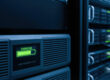 UPS battery backup system installed in a server rack providing backup power and surge protection for business IT infrastructure during a power outage.