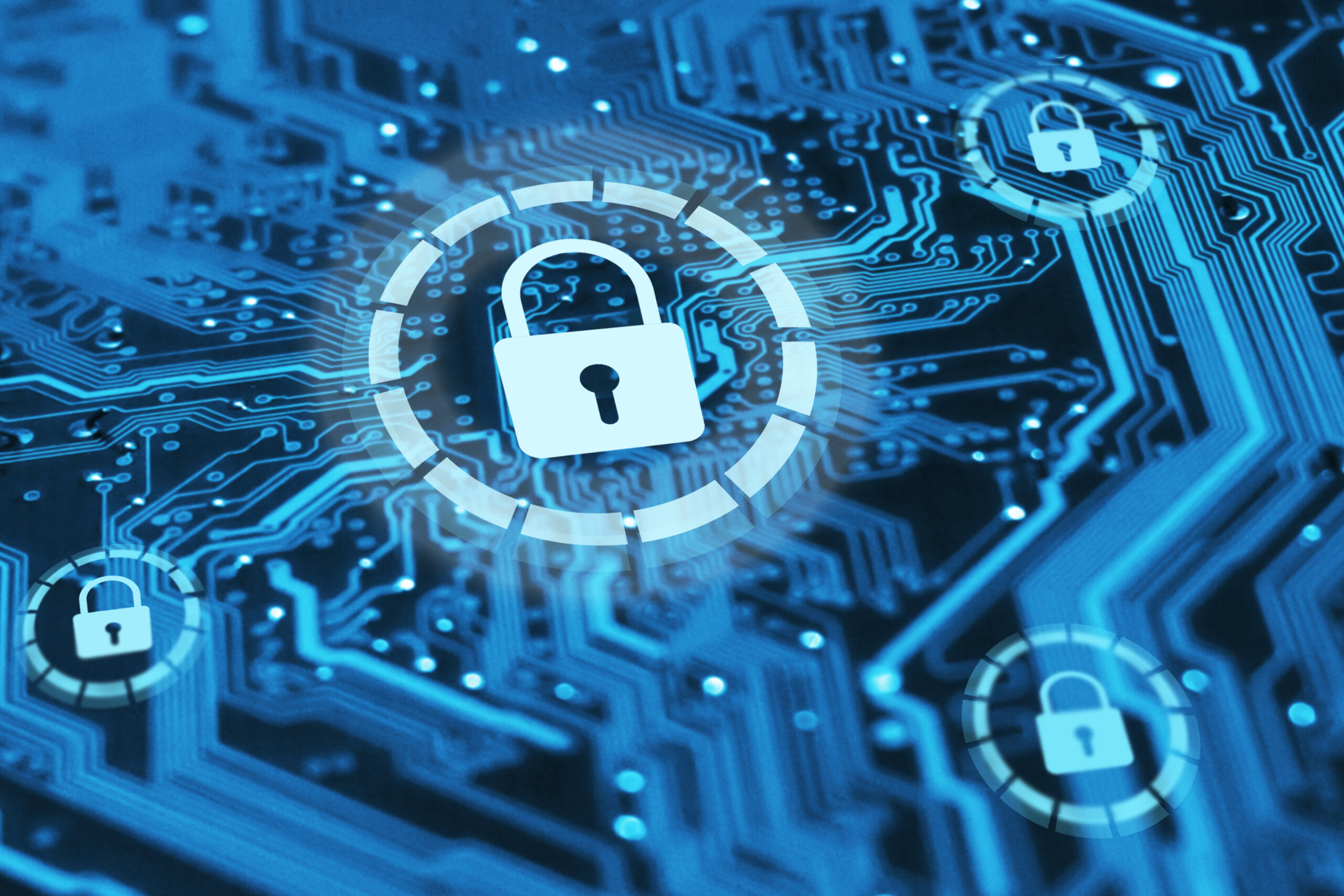 Digital cybersecurity concept showing multiple padlock icons over a blue computer circuit board representing remote employee security and data protection.