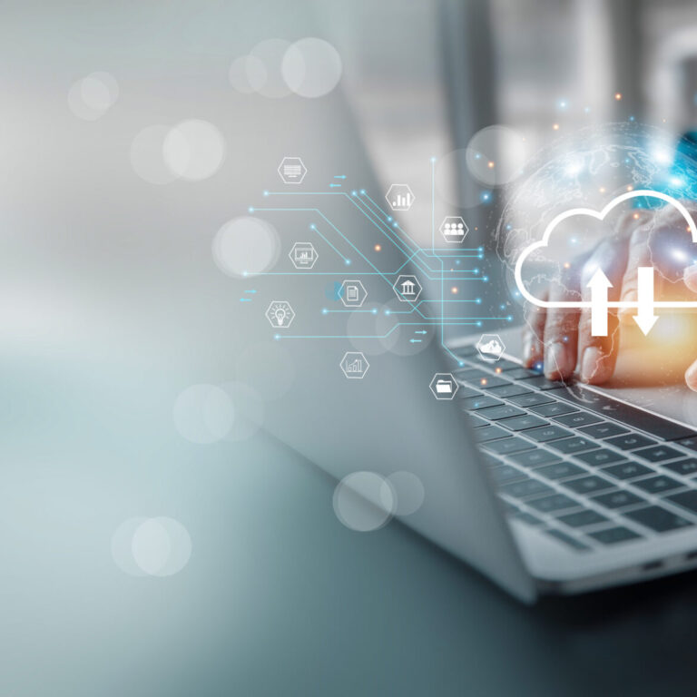 Person using a laptop with cloud storage interface and security icons representing secure cloud storage and data protection