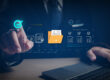 Business professional managing digital documents and approval workflows on a virtual interface, highlighting the importance of IT documentation for efficient support, cybersecurity, and business continuity.