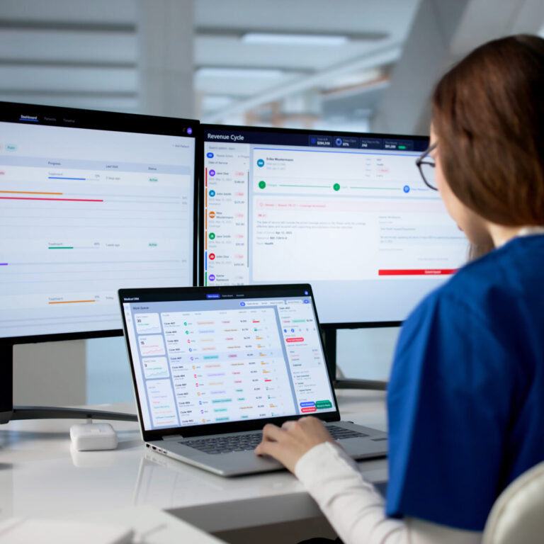 IT professional reviewing a documented network and business systems across multiple monitors, highlighting the importance of network documentation, network diagrams, and organized IT infrastructure for efficient management and disaster recovery.